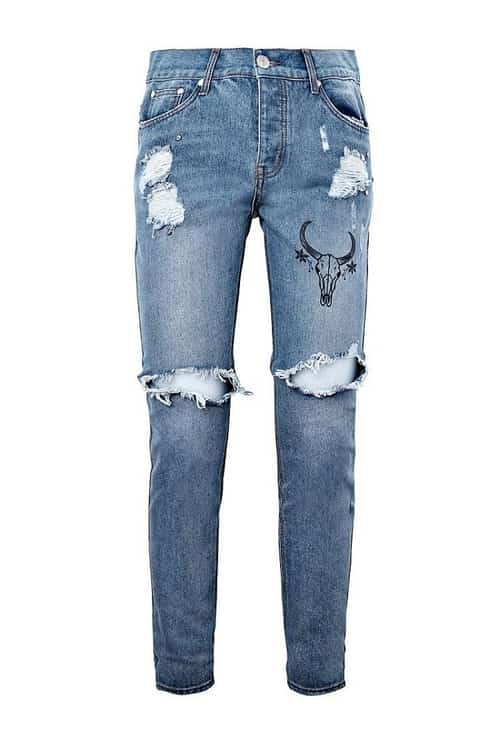 SALE - SKINNY FIT RIPPED KNEE JEANS WITH PRINT!