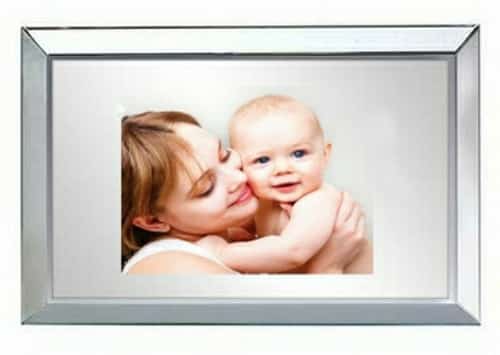 YOUR PHOTOGRAPH in a MIRROR. your own Photograph superimposed into a MIrror behind the glass