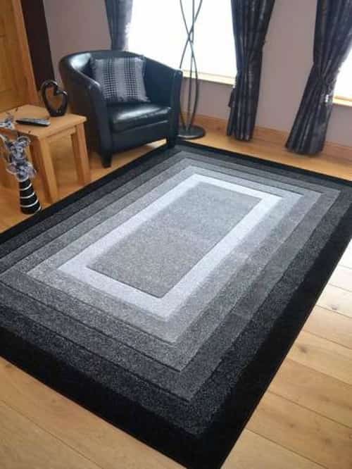 Plain Border Black Rug
