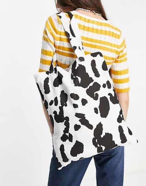 ASOS DESIGN cotton shopper bag in cow print current price - £8.00!