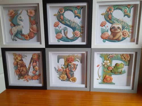 New deal on 18 by 18 cm wooden shadow boxes Alphabet with cute creatures.