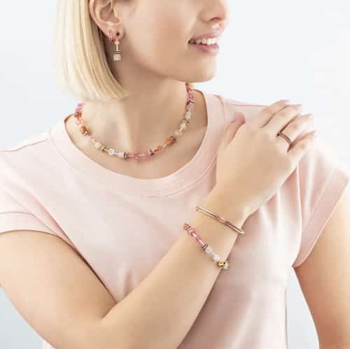 Shine Bright with 20% Off the Coeur De Lion Deluxe Geocube Necklace in Gold Rose and Orange!