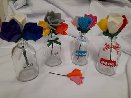 These lovely glass vases with handmade felt flowers are on a reduced introductory price.
