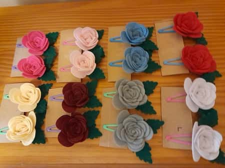 2 FELT ROSE HAIR CLIPS HAIR ACCESSORIES.