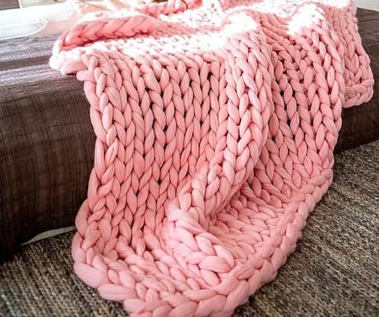 Get FREE delivery - Soft chunky knitted throw in pink £60.00!