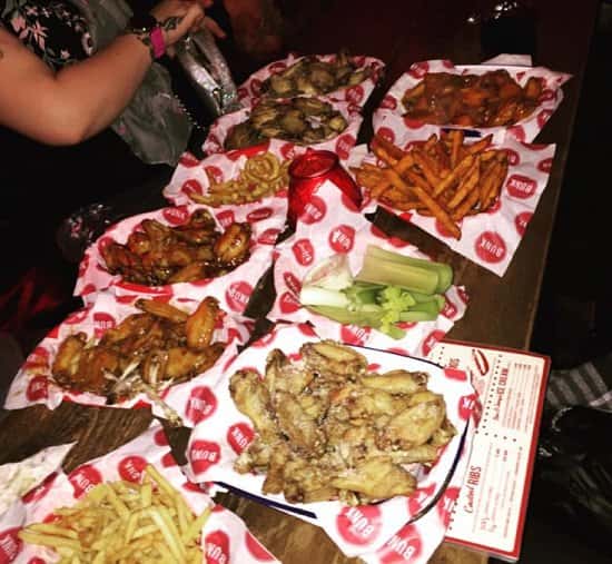 Here's an invite to partake in a Bunk feast after work this evening: Half Price Wings until 10pm!