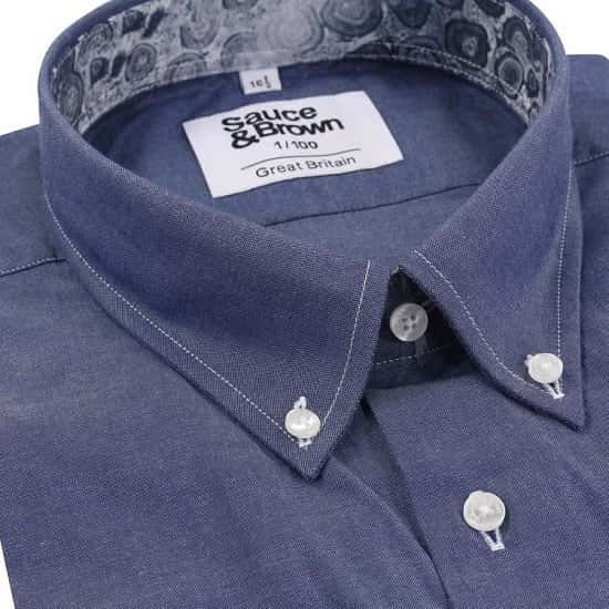 100% cotton with a denim twist and Blue Rock print collar and cuff detail.