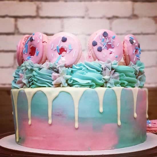 A beautiful "doughnut" drip cake made by our head Baker