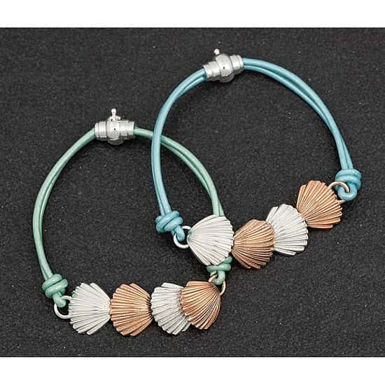 Leather bracelet in aqua with gold and silver seashells