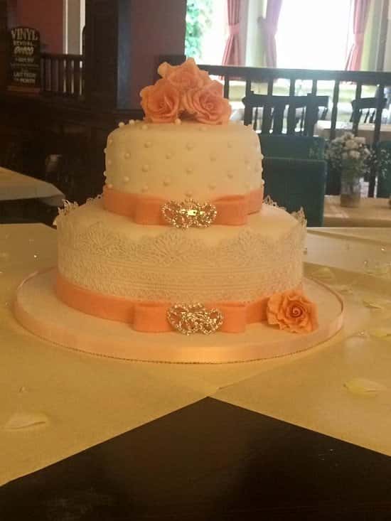 Peach and ivory theme wedding cake!