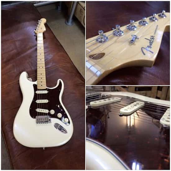Here's a beautiful Fender Deluxe Stratocaster. Like new, £1120.