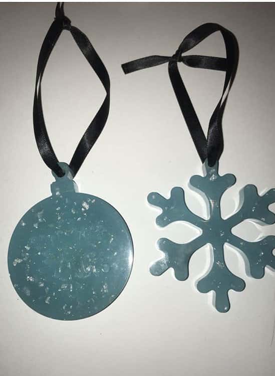Handmade resin glow in the dark two baubles