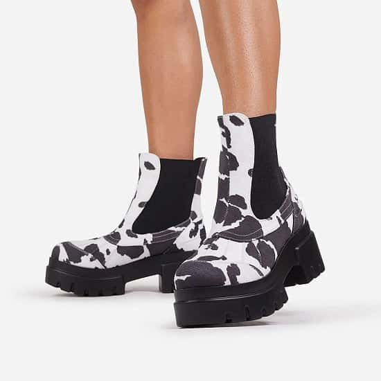 SAVE - Raven Chunky Sole Ankle Biker Boot In Cow Print Faux Suede