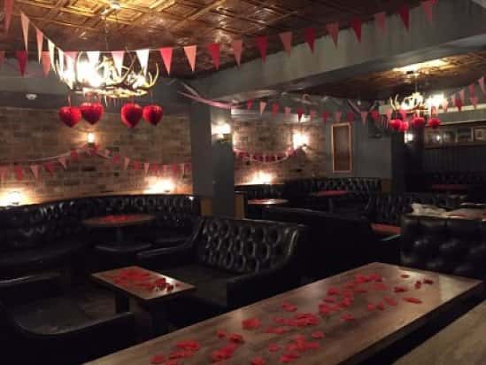Look at the set up for this evening!!! can't get more romantic than rose petals on all the tables..