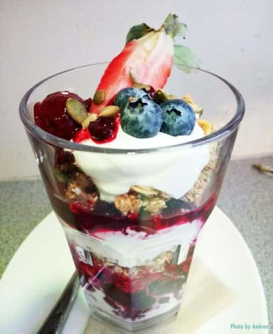BREAKFAST - Layers of our homemade granola, natural yogurt, summer berry compote and raspberry syrup