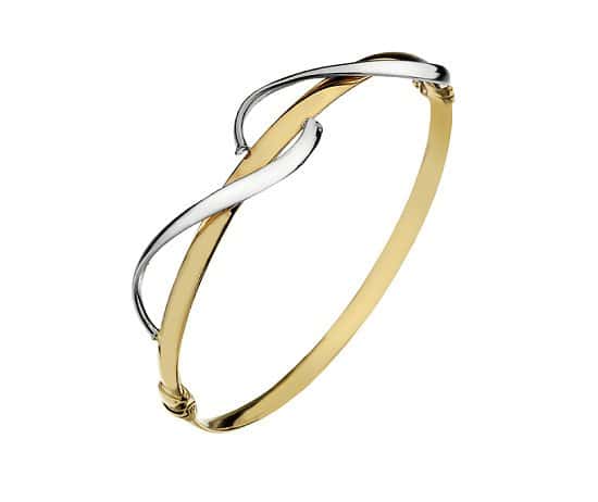 9ct yellow & white gold, wave detail hollow bangle from Callibeau Jewellery