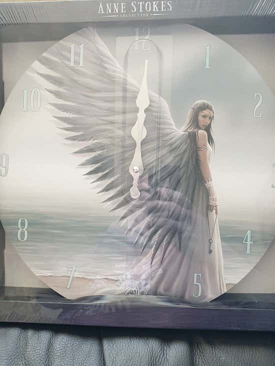 WIN an Anne Stokes Aly Fell Wall Clock!