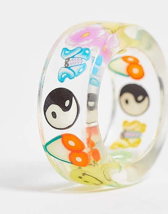 ASOS DESIGN plastic ring with trapped kitsch charms in clear current price - £6.00!