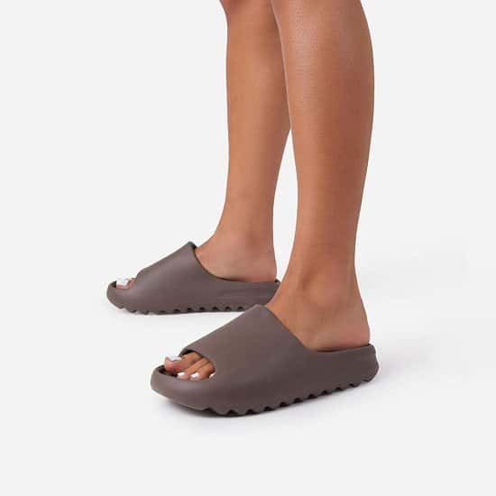 50% Off Kendall Faux Shearling Flat Slider Sandal In Chocolate Brown Rubber