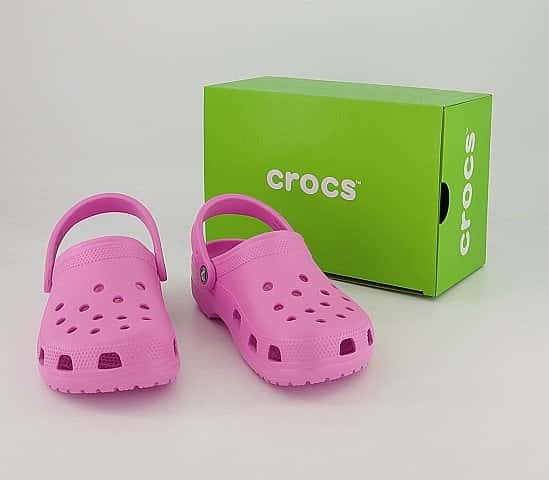 Pink and green crocs sales