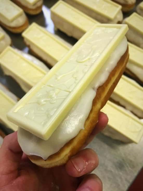 White Chocolate Frosted, Milky Bar Topped and Vanilla Cream Filled, Doughnut Eclair just Landed!