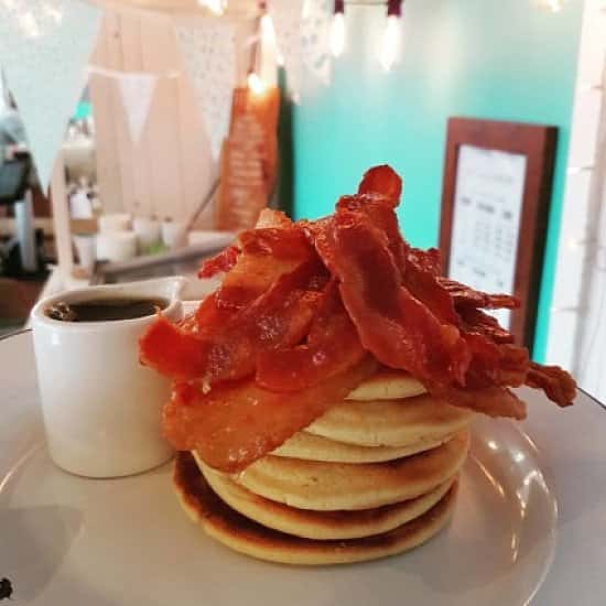 Served all day every day: American Style Pancakes with REAL Canadian Maple Syrup and Crispy Bacon