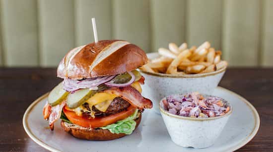 Enjoy one of our Burgers from £9.95 - Served with Skinny Fries and Coleslaw!