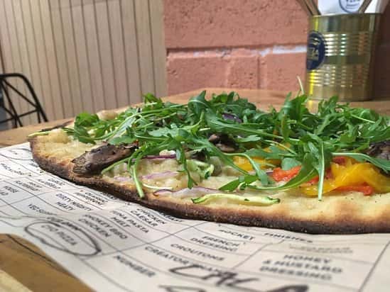 Our new vegan pizza is now available and it's delicious
