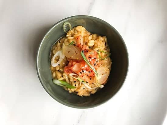 Try our Kimchi Risotto with baby soy pickled onions - Email to book or walk-in.