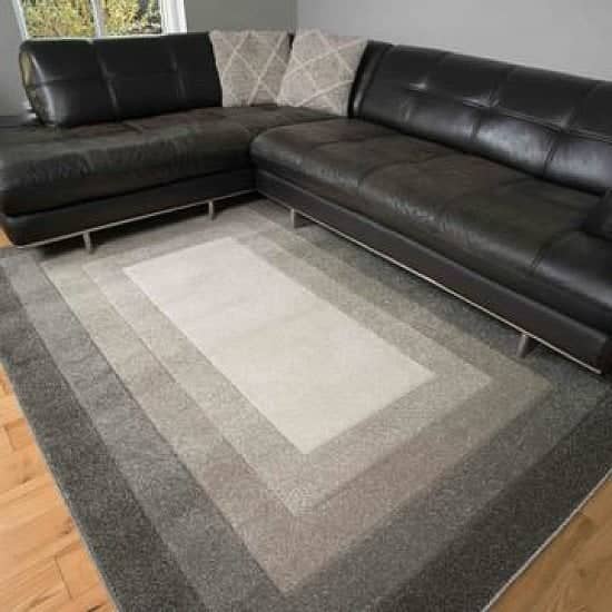 Soft layered bordered rug