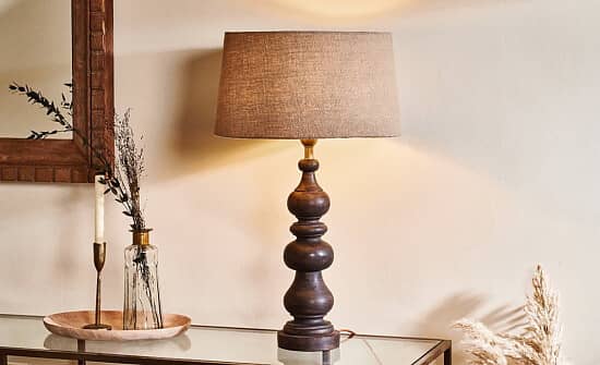Illuminate your space with the Manua Wood Table Lamp - Large, now at a 20% discount!